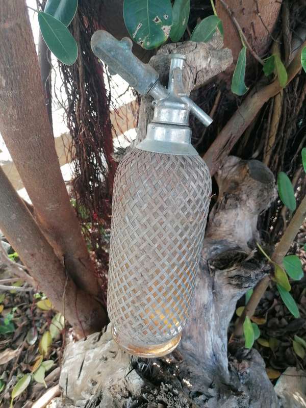 Vintage 1940`s soda stream/wire mess bottle