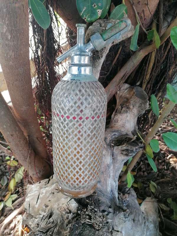 Vintage 1940`s soda stream/wire mess bottle