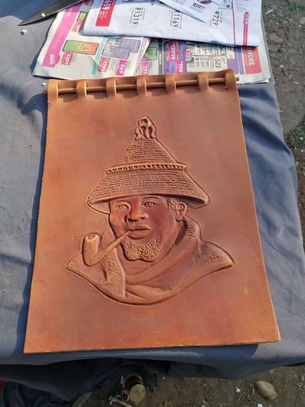 vintage african tooled leather wall art