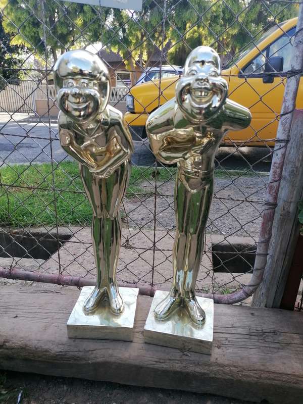 Pair of tall sculptures