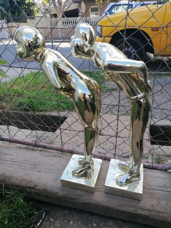Pair of tall sculptures