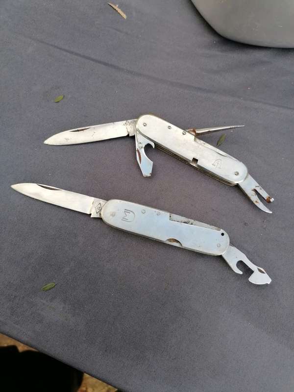 2 military knives. Needs some tlc