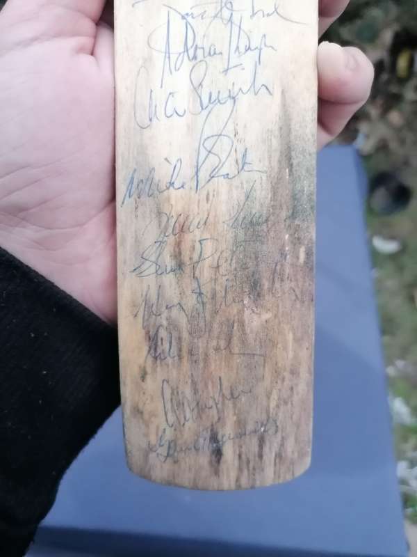 Minature cricket bat signed by Clive Rice and team