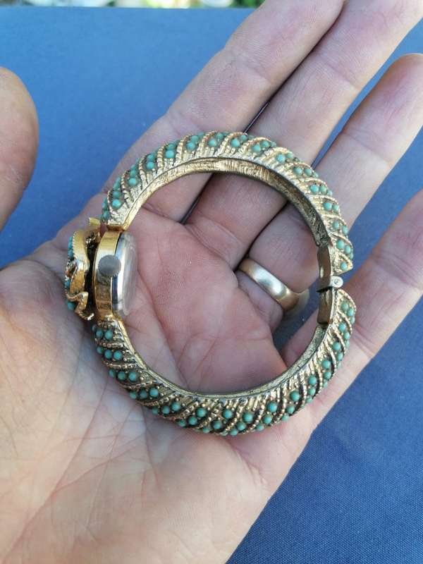 Vintage 1950s Ladora Gold Tone Faux Turquoise Encrusted Ladies Hidden Face Bracelet Watch