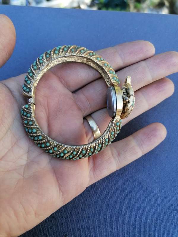 Vintage 1950s Ladora Gold Tone Faux Turquoise Encrusted Ladies Hidden Face Bracelet Watch