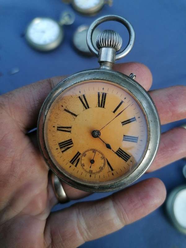 Antique lot of pocket watches and cases. Not working