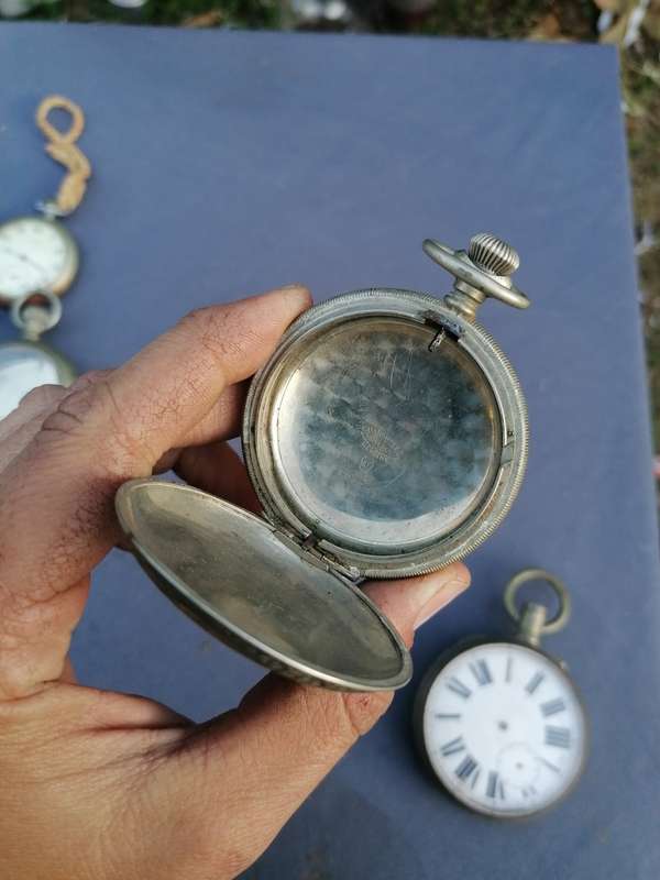 Antique lot of pocket watches and cases. Not working