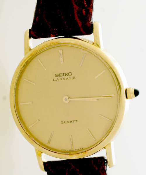 14K Real Gold Bezel Seiko Lassale watch.