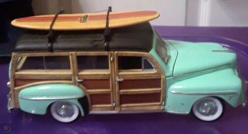 1948 Ford Woody with Surfboard.