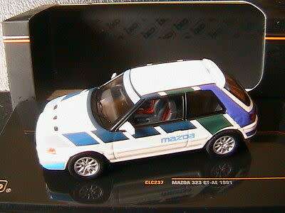 Mazda 323 GT-AE 1991 White, Blue, Green. Violet.