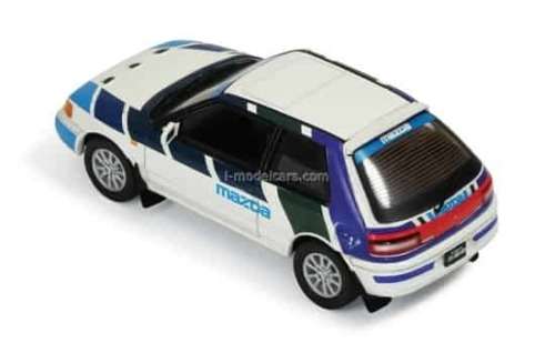 Mazda 323 GT-AE 1991 White, Blue, Green. Violet.