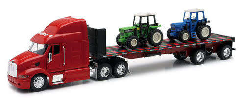 Peterbilt 387 with Flatbed Hauling 2 Farm Tractors