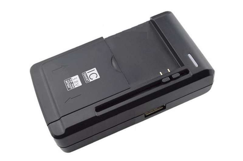 Universal Charger for Cellphone/Flat Battery with USB Charging Port (Black)..!