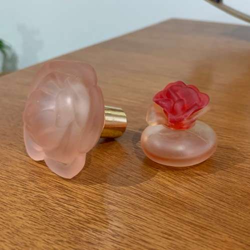 Rose-themed miniature perfume bottles