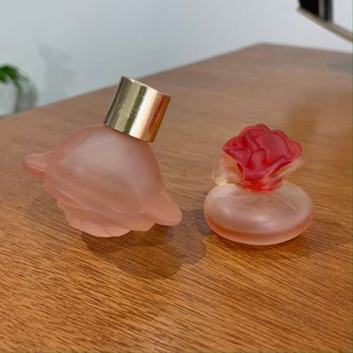 Rose-themed miniature perfume bottles