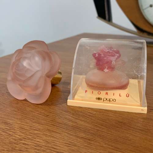 Rose-themed miniature perfume bottles