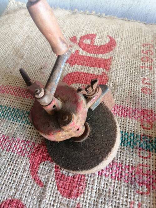 Old hand turned grind stone