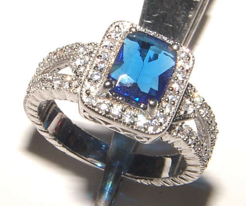 PURE PERFECTION! SOLID .925 STERLING SILVER RING WITH SAPPHIRE AND SIMULATED DIAMONDS!