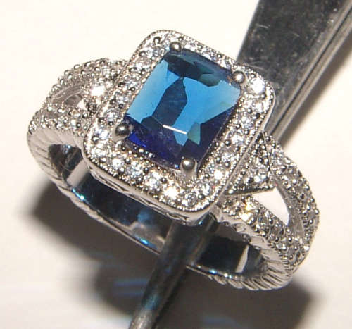PURE PERFECTION! SOLID .925 STERLING SILVER RING WITH SAPPHIRE AND SIMULATED DIAMONDS!