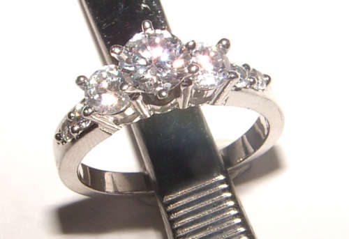 PURE PERFECTION! SOLID .925 STERLING RING WITH SIMULATED DIAMONDS!