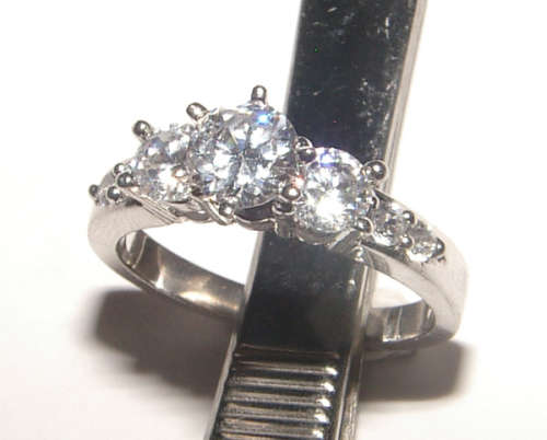 PURE PERFECTION! SOLID .925 STERLING RING WITH SIMULATED DIAMONDS!