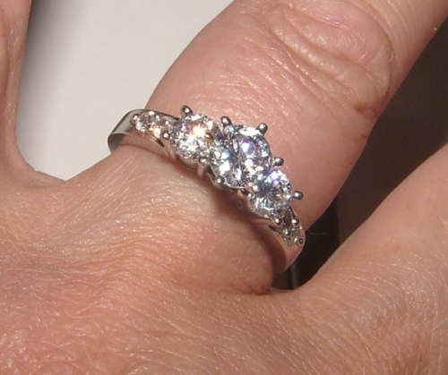 PURE PERFECTION! SOLID .925 STERLING RING WITH SIMULATED DIAMONDS!
