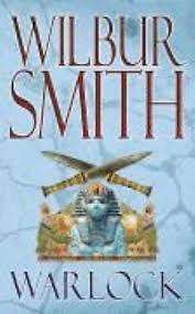PAPERBACK - WILBUR SMITH - WARLOCK  (CONDITION NEW)