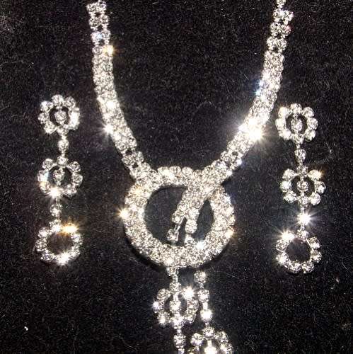 RHINESTONE ENCRUSTED SILVER NECKLACE AND EARRINGS SET
