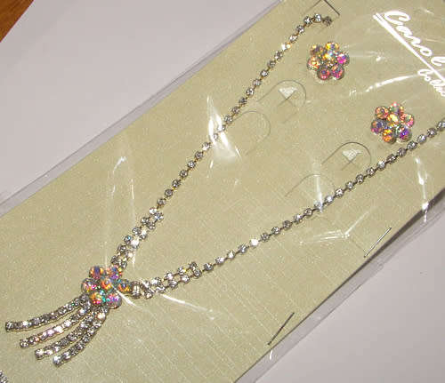RHINESTONE ENCRUSTED SILVER NECKLACE AND EARRINGS SET
