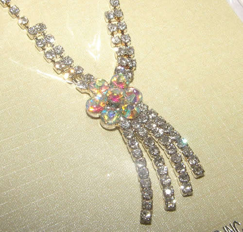 RHINESTONE ENCRUSTED SILVER NECKLACE AND EARRINGS SET