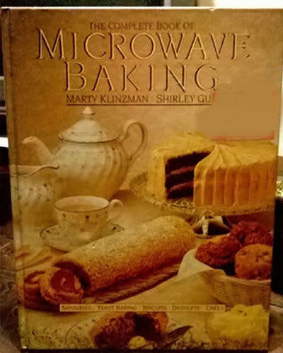 HARD COVER  -  THE SOUTH AFRICAN BOOK OF MICROWAVE BAKING BY KLINZMAN & GUY.  (READING COPY)
