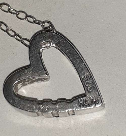 DESIGNER (SIGNED) DIAMOND PENDANT WITH .925 STERLING SILVER CHAIN
