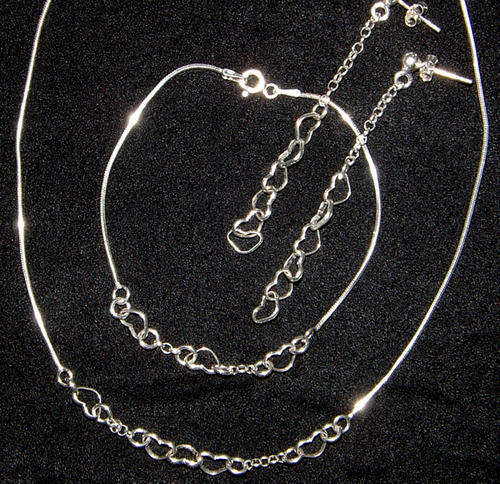 ***A MUST TO OWN!!*** !! Solid Sterling Silver Necklace, Bracelet AND earring Set!!