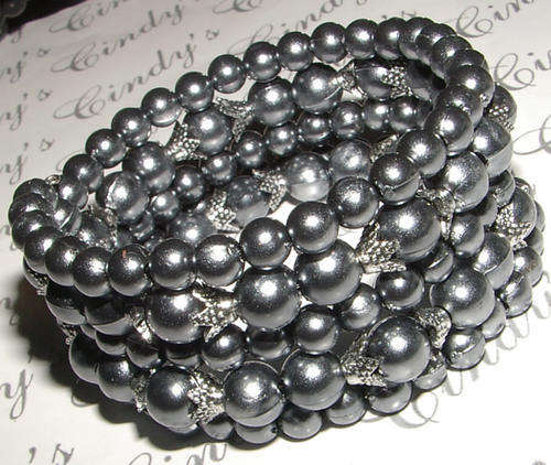 MULTI STRAND PEARLY BEADED BRACELET!
