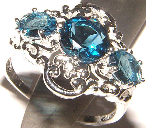 ***GORGEOUS AND NEW!!!***STUNNING PARAIBA TOPAZ COLOUR CZ STERLING SILVER RING!!!