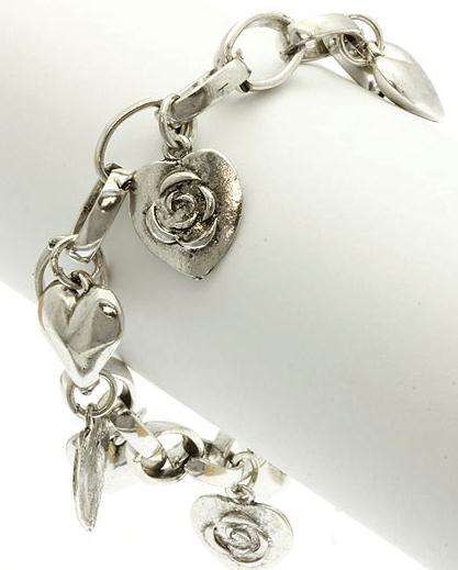 ***STUNNING***STUNNING*** SILVER HEARTS AND ROSE CHARM BRACELET
