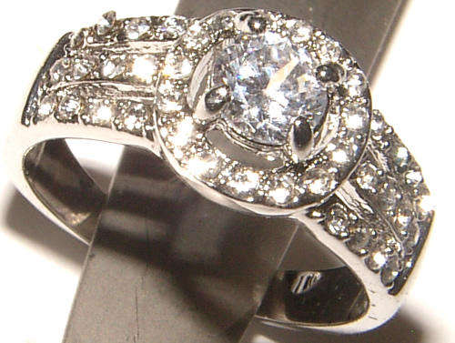**GORGEOUS!**BEAUTIFUL CZ AND RHINESTONE ENCRUSTED DRESS RING!