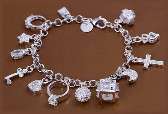 ***CHARM- ING!*** CUTE STERLING SILVER CHARM BRACELET!