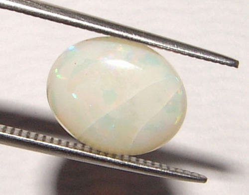 AUSTRALIAN OPAL -  MULTICOLOUR OVAL CUT  - 2.430cts!!