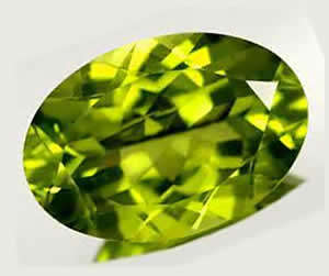NATURAL PERIDOT -  NICE GREEN OVAL CUT - 0.630cts