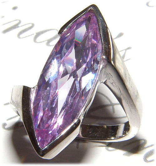 MARQUISE LAVENDER CZ  RING IN STERLING SILVER .