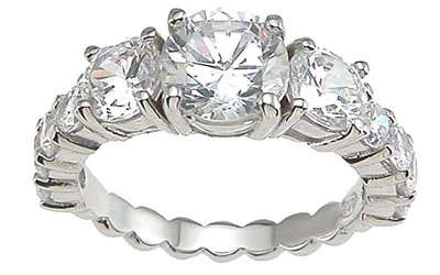 THREE STONE WHITE CZ STERLING SILVER RING.