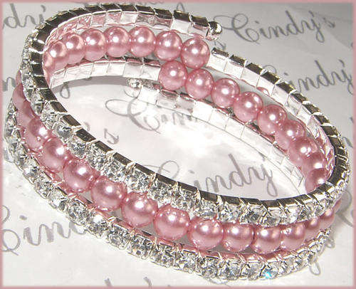 ***NEW AND FEMININE*** MULTI STRAND PEARL AND RHINESTONE BRACELET!