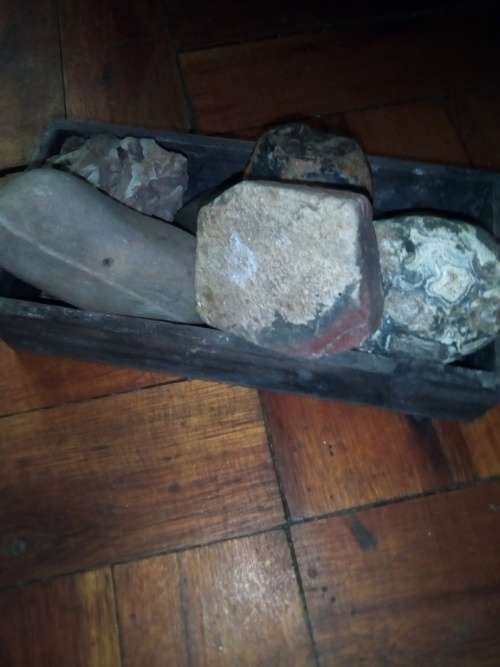 wooden box with interesting rocks stones