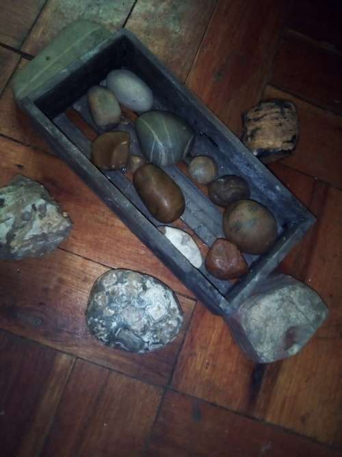 wooden box with interesting rocks stones