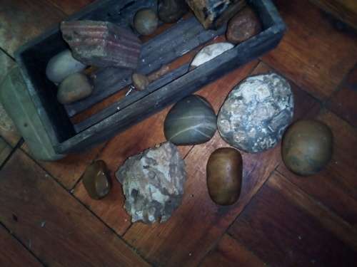 wooden box with interesting rocks stones