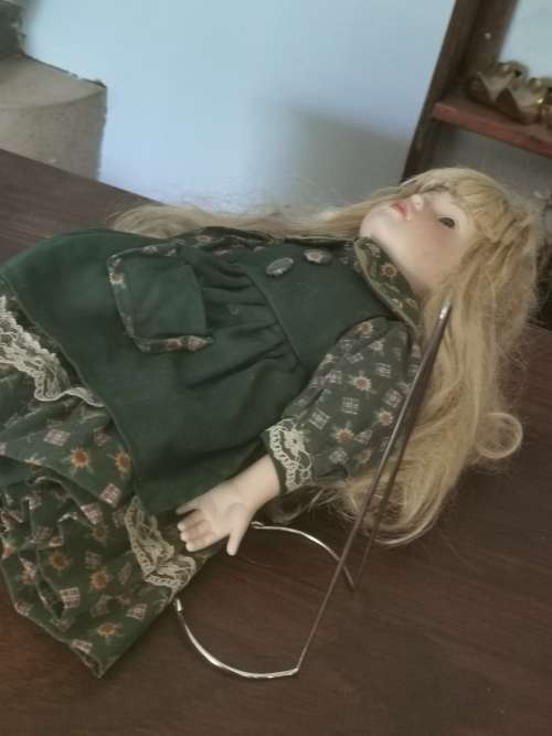 VINTAGE PORCELAIN DOLL WITH STAND