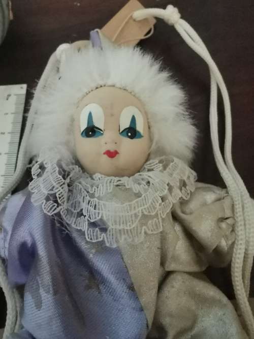 VINTAGE SMALL CLOWN DOLL ON SWING