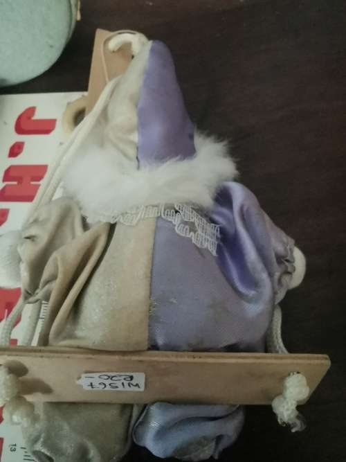 VINTAGE SMALL CLOWN DOLL ON SWING