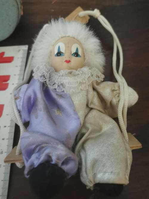 VINTAGE SMALL CLOWN DOLL ON SWING